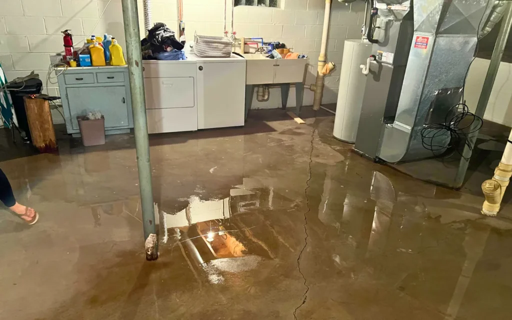 A flooded basement representing one of the common causes of water damage in Lexington homes
