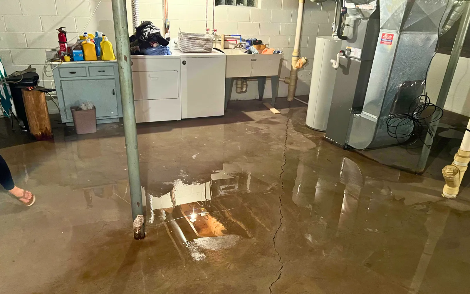 A flooded basement representing one of the common causes of water damage in Lexington homes