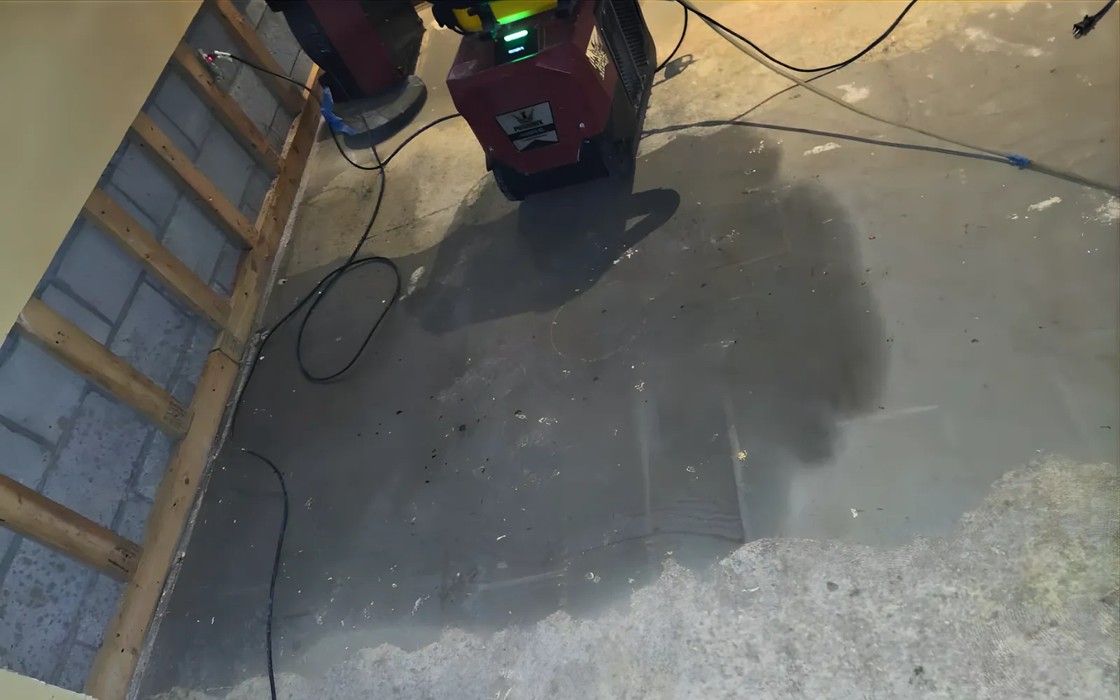 Moisture under floor after significant water damage in a Lexington home