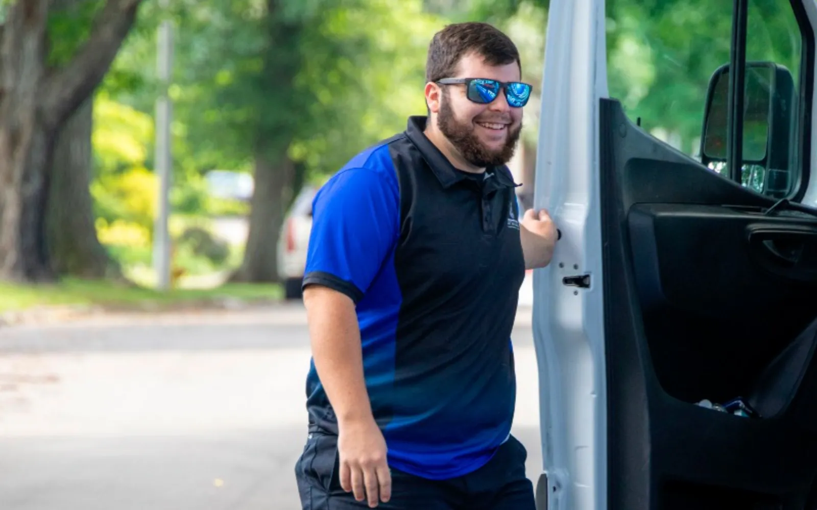 One of Spotless' team exiting his truck outside a Lexington home