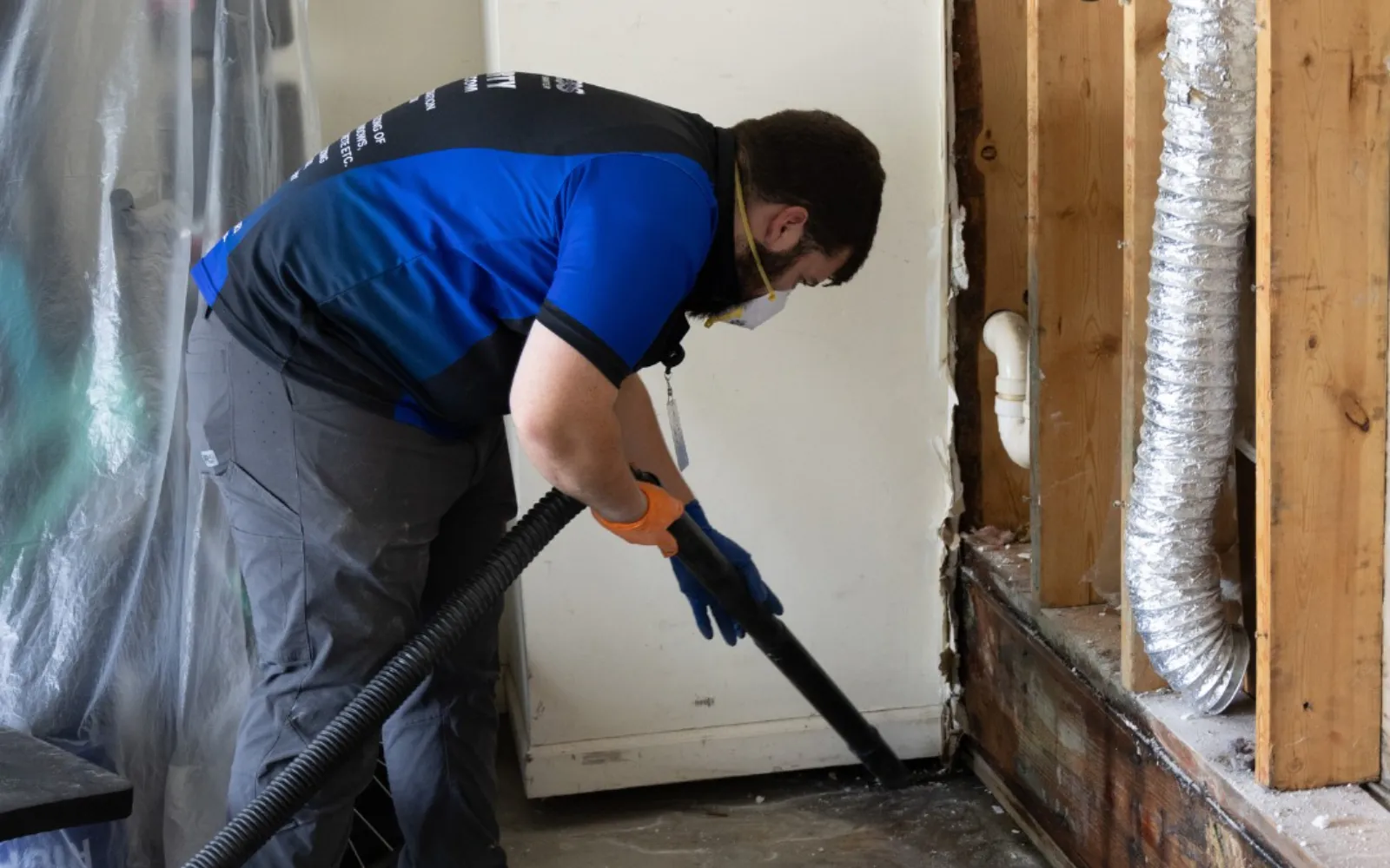 One of Spotless' crew during mold cleanup and contamination removal